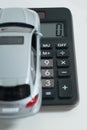 Zero, calculator, a model car. Royalty Free Stock Photo