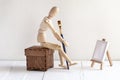 Concept for drawing. Wooden Mannequin For Painting With brush and malbert