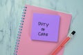 Concept of Duty of Care write on sticky notes isolated on Wooden Table Royalty Free Stock Photo