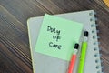 Concept of Duty of Care write on sticky notes isolated on Wooden Table Royalty Free Stock Photo