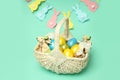 Concept of Easter eggs on mint background Royalty Free Stock Photo