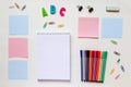 Concept of education. on a white background are spread out notes and colored markers Royalty Free Stock Photo