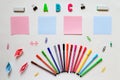 Concept of education. on a white background are spread out notes and colored markers Royalty Free Stock Photo