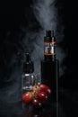 The concept of electronic cigarettes with grape on a background of smoke Royalty Free Stock Photo