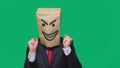 Concept of emotion, gestures. a man with a package on his head, with a painted smiley angry, sly, gloating Royalty Free Stock Photo