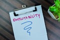 Concept of Employability write on paperwork isolated on Wooden Table Royalty Free Stock Photo