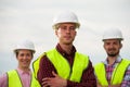 Concept of engineers and windmills Royalty Free Stock Photo