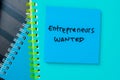 Concept of Entrepreneurs Wanted write on sticky notes isolated on Wooden Table Royalty Free Stock Photo