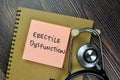 Concept of Erectile Dysfunction write on sticky notes isolated on Wooden Table Royalty Free Stock Photo