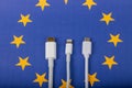 EUROPEAN UNION flag and USBC universal charging cable as a standard for small electronic devices Royalty Free Stock Photo