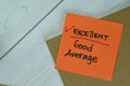 Concept of Excelent, Good, Average write on sticky notes isolated on Wooden Table