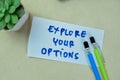 Concept of Explore Your Options write on sticky notes isolated on Wooden Table Royalty Free Stock Photo