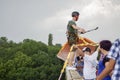 Concept of Extreme Sports and Fun. A man is a  thrill-seeker and a  rope jumper from the bridge. He is very happy to make a dream Royalty Free Stock Photo