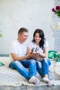 Happy beloved man and pregnant woman at home Royalty Free Stock Photo