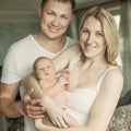 concept of family happiness - portrait of happy parents and newb Royalty Free Stock Photo
