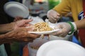 The Concept of Feeding : The poor have been sharing food from the kinder society to Relieve Hunger : Social concept of poor people