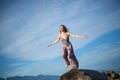 Concept feminine confidence young woman ready to fly