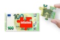 The concept of financial crisis and recession. 100 euros note isolated on a white background