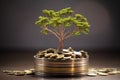 Green tree leaves are a symbol of a thriving business. Concept of financial growth, prosperity and success. The plant grows on the Royalty Free Stock Photo