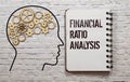Concept of Financial Ratio Analysis write on sticky notes isolated on Wooden Table Royalty Free Stock Photo