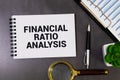 Concept of Financial Ratio Analysis write on sticky notes isolated on Wooden Table Royalty Free Stock Photo