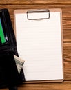 The concept of financing and credit during a pandemic. A blank sheet of paper next to the wallet. Copy space. Royalty Free Stock Photo
