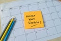 Concept of Flexible work schedule write on sticky notes isolated on Wooden Table