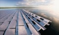 Concept of a floating solar panel array in beautifull calm morning lake with distant wild forest in background. Royalty Free Stock Photo