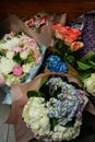 the concept of a flower shop. Close-up of several beautiful lovely bouquet of mixed flowers. Wallpaper