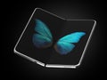 Concept of foldable smartphone folding on the longer side with butterfly image on screen. Flexible smartphone isolated on black Royalty Free Stock Photo