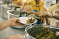 Concept of food sharing for the poor to alleviate hunge Royalty Free Stock Photo