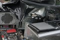 Concept of freedom from computer addiction - Man breaks system unit of a computer with a hummer outside, lake with