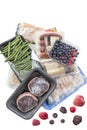 Concept of freezing, bunch of frozen food meat, Vegetables, fish, fruits, on a white background