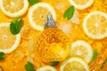 Concept of freshness, perfume bottle, lemon slices, close up