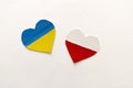 The concept of friendship and support countries , heart in the colors of the flag of Ukraine and Poland. Royalty Free Stock Photo