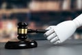 Concept of future and fair justice system by robotic holding gavel. Equilibrium