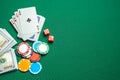 Concept of gambling in casino, sports poker. Playing cards with dice and colored chips with cash money dollars on green gaming Royalty Free Stock Photo