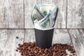 Concept : generous tip for a cup of morning coffee