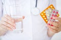 Concept Of The Global Healthcare And Medicine. Doctor Holding Pack of Different Tablet Blisters Closeup. Life Save