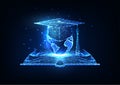 Concept of global, international education with open book, graduation cap and planet Earth on blue Royalty Free Stock Photo