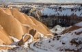 Concept of global warming. Morocco, High Atlas Mountains. Peak covered by snow and Sand dunes in the Sahara Desert Royalty Free Stock Photo