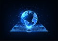 Concept of global worldwide education with open book and planet Earth globe on dark blue Royalty Free Stock Photo