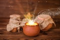 Concept greeting card of clay pots with mystical miracle light o Royalty Free Stock Photo