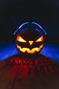 Concept of Halloween. Pumpkin jack Lamp, in headphones with CDs Royalty Free Stock Photo