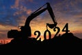 Concept happy new year 2024,crawler excavator silhouette