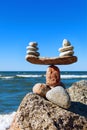 Concept of harmony and balance. Balance stones against the sea. Royalty Free Stock Photo