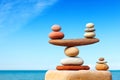 Concept of harmony and balance. Balance stones against the sea. Royalty Free Stock Photo