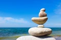 Concept of harmony and balance. Rock Zen on the background of summer sea Royalty Free Stock Photo