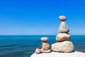 Concept of harmony and balance. Rock Zen on the background of summer sea