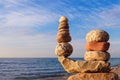 Concept of harmony and balance. Rock Zen at sunset. Royalty Free Stock Photo